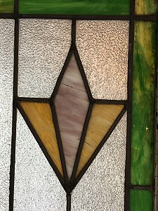 Antique Art Deco Stained Glass Window With Green Slag Glass and Shield Motif