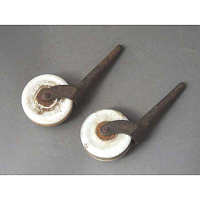 Set of 2 Antique Porcelain Casters