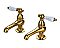 Kingston Brass Basin Faucet, Porcelain Levers - Polished Brass